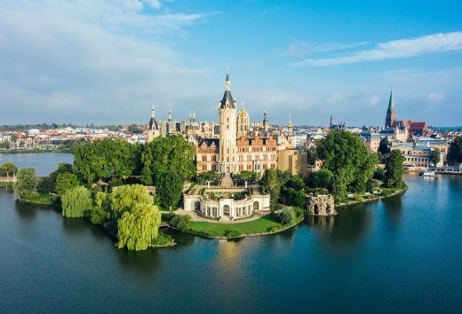 schwerin castle its splendor still shines beyond the green expanses of its